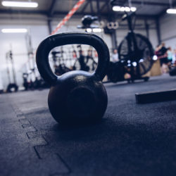 Heavy metal kettle bell weight on the floor